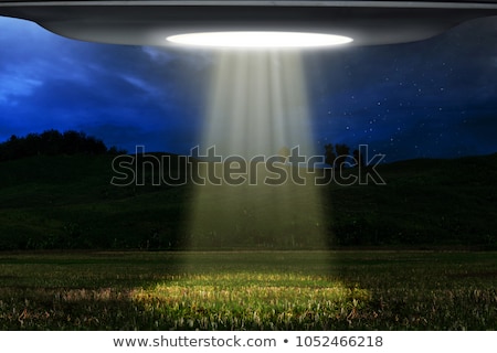 ufo-flying-night-450w-1052466218